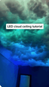 Screenshot of a Video Pin showing a bedroom ceiling covered in multicolored clouds. Text overlay says "LED cloud ceiling tutorial."