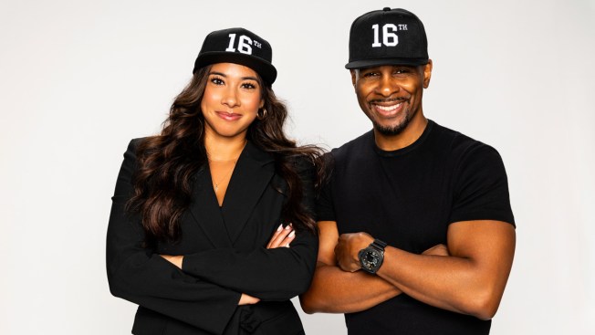 Two people wearing hats